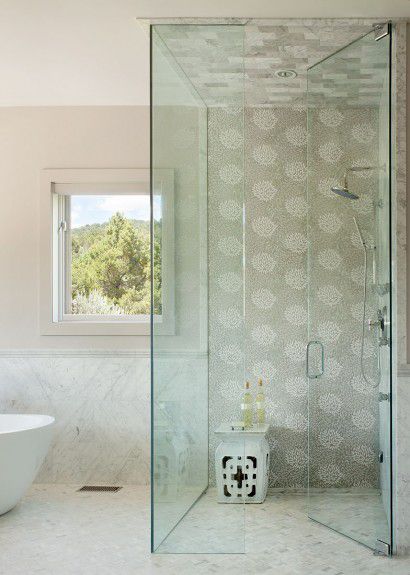 Floor to ceiling glass shower with Decorative Materials tiles designed by Runa Novak of In Your Space Interior Design - InYourSpaceHome.com and RunaNovak.com
